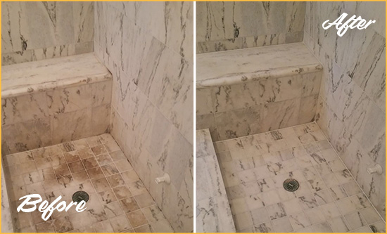 Before and After Picture of a Sudley Springs Marble Shower Honed to Remove Dark Stains